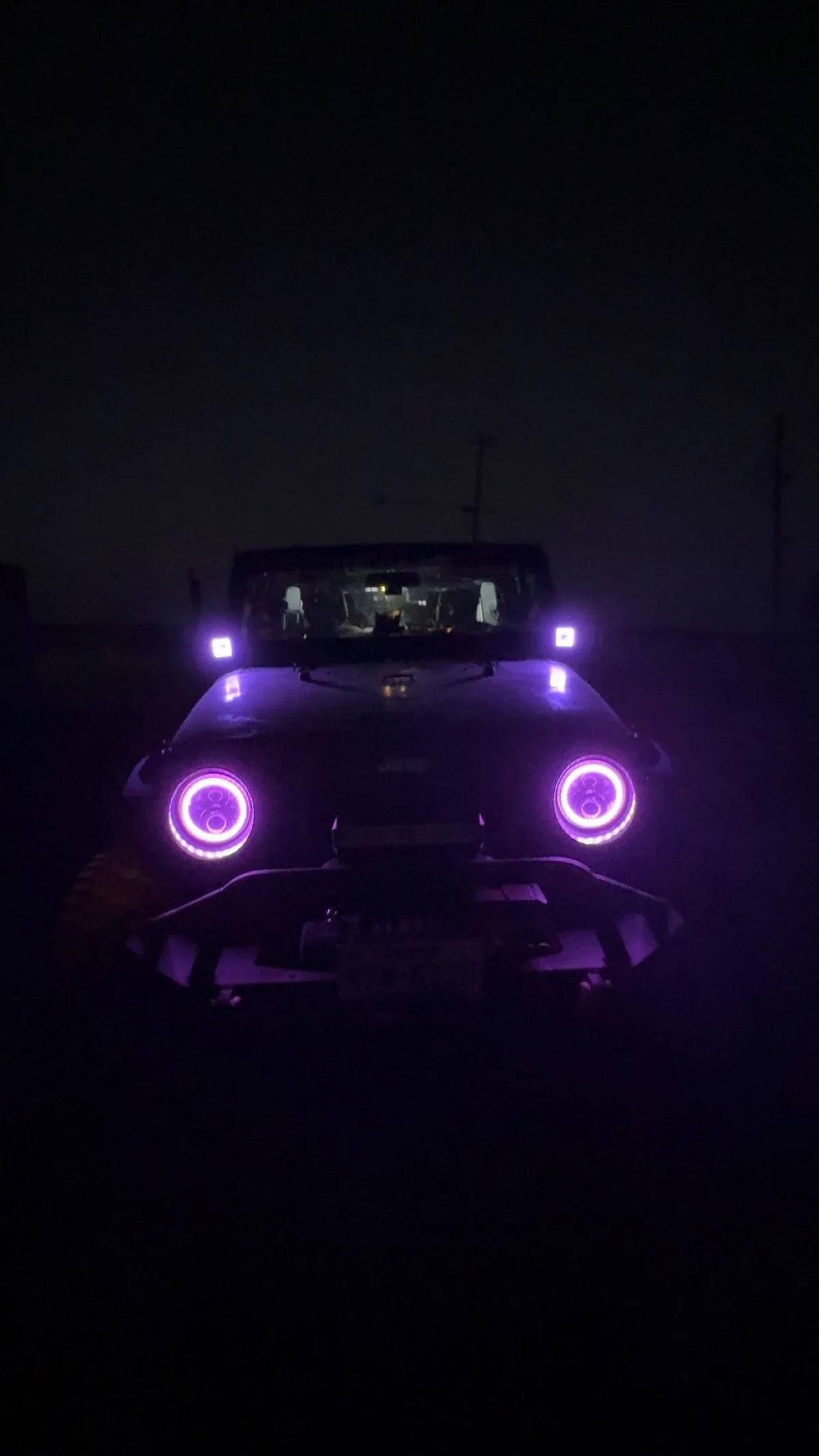 Jeep with purple halo and auxiliary lighting