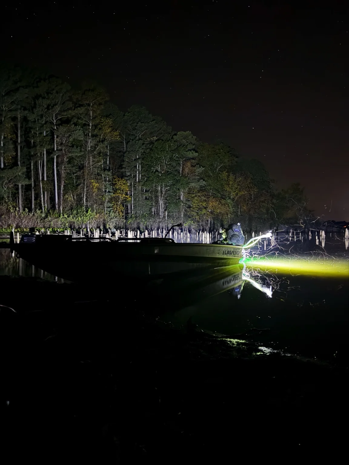 Boat lighting project on the water at night